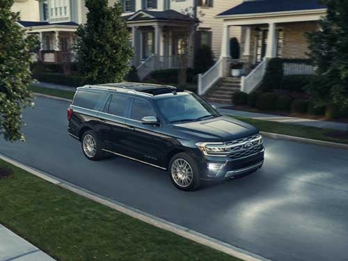 2023 Ford Expedition aerial view of vehicle driving down a street