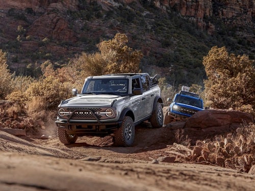 2024 Ford Bronco driving on a rocky path