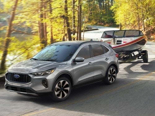 2024 Ford Escape towing a boat