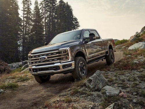 2024 Ford Super Duty driving down a mountain