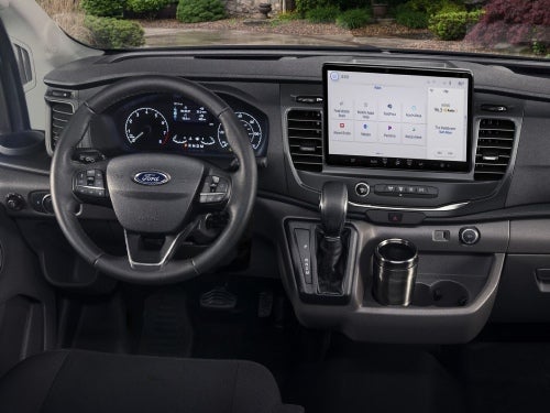 2024 Ford Transit view of dash, including touchscreen and center console storage